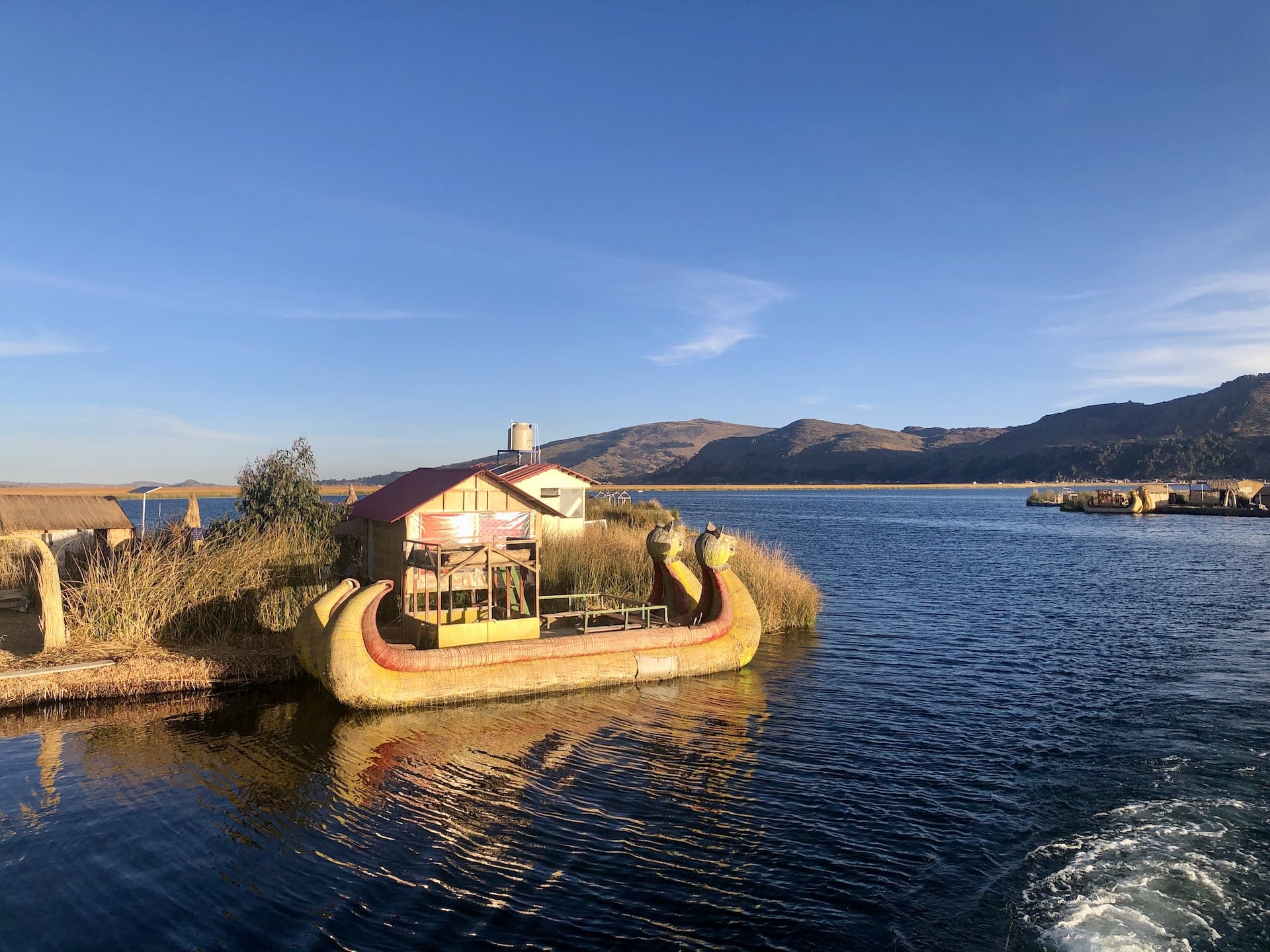 Lake Titicaca, Peru Traditional Uros boat at the floating islands on Lake Titicaca.