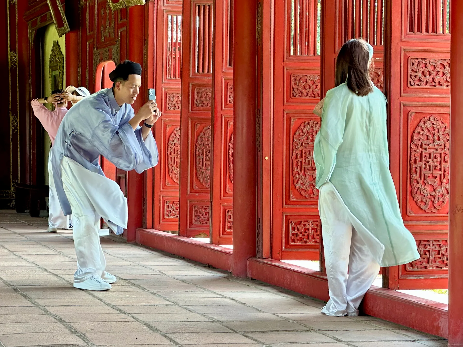 Locals love to dress up in traditional Vietnamese clothes at historic places.