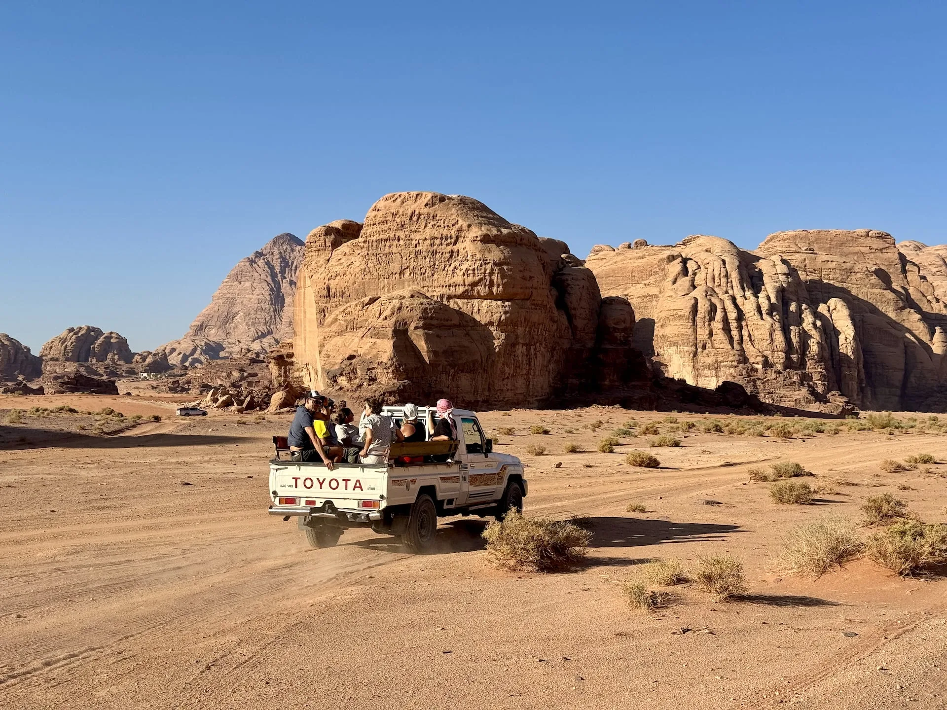 Wadi Rum, Jordan A truck crossing the Wadi Rum desert in Jordan.