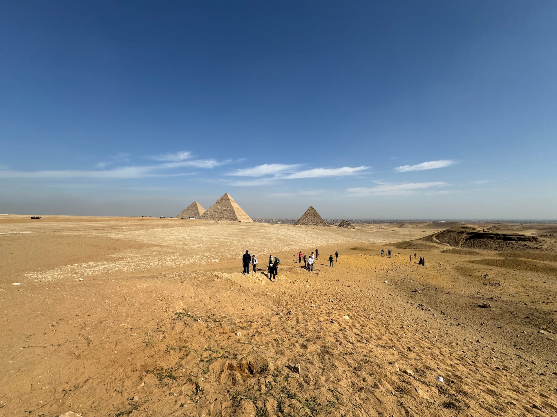 Giza Pyramids, Egypt The Giza Pyramids from a distance. You can see Cairo in the background