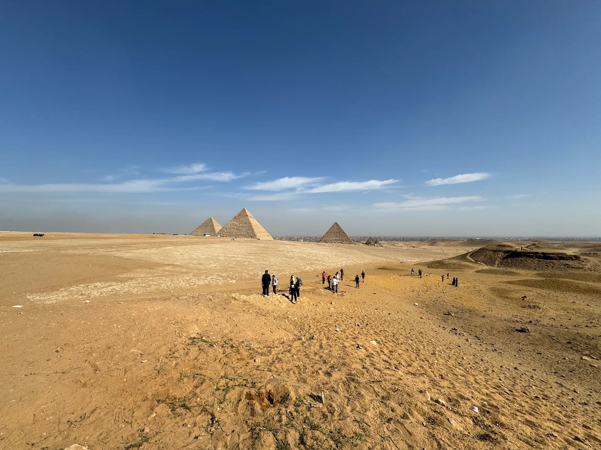 Giza Pyramids, Egypt The Giza Pyramids from a distance. You can see Cairo in the background