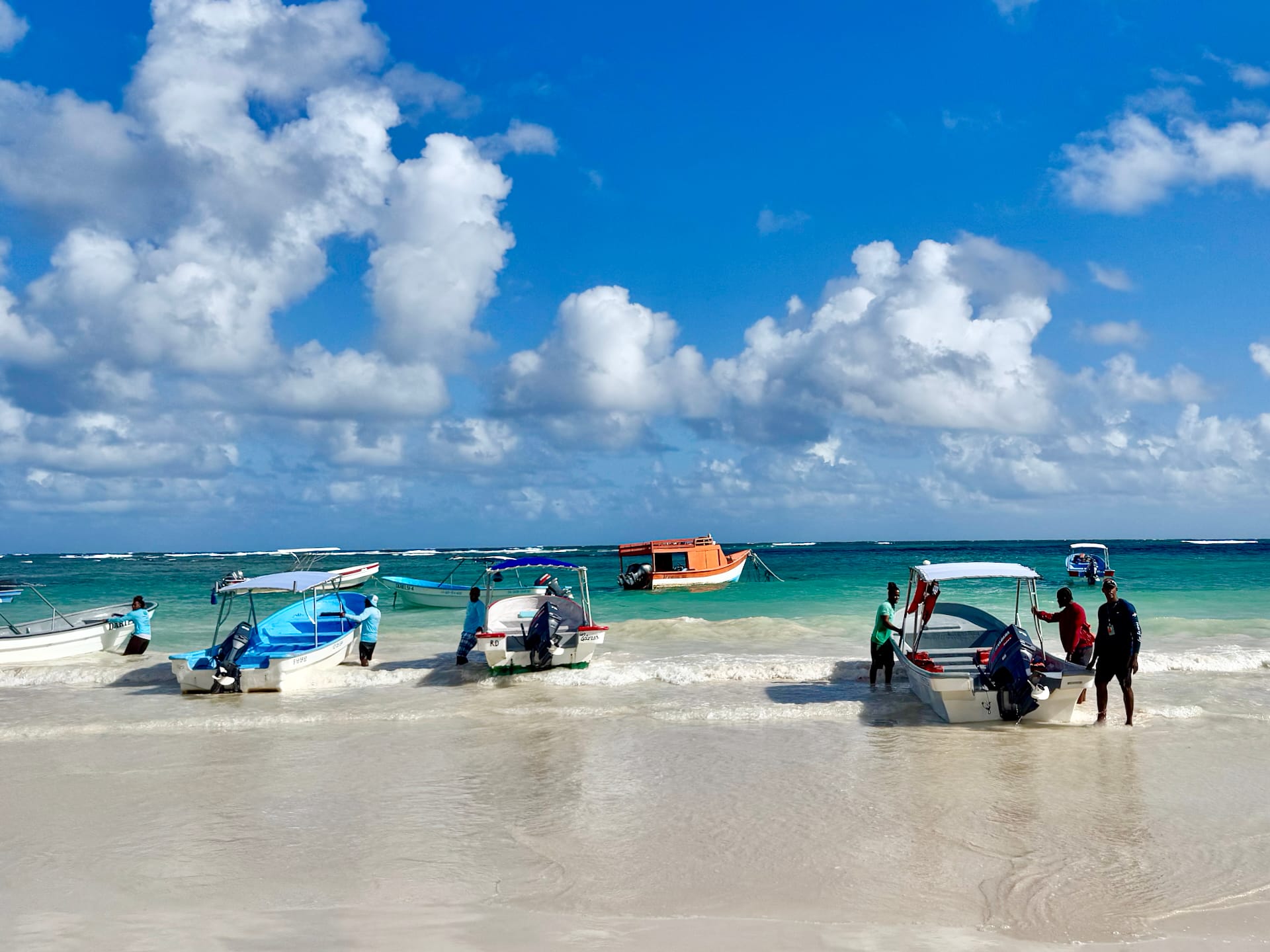 Las Galeras, Dominican Republic Boats lining up on the beach of Las Galeras. Our's is on the right, with Francois.