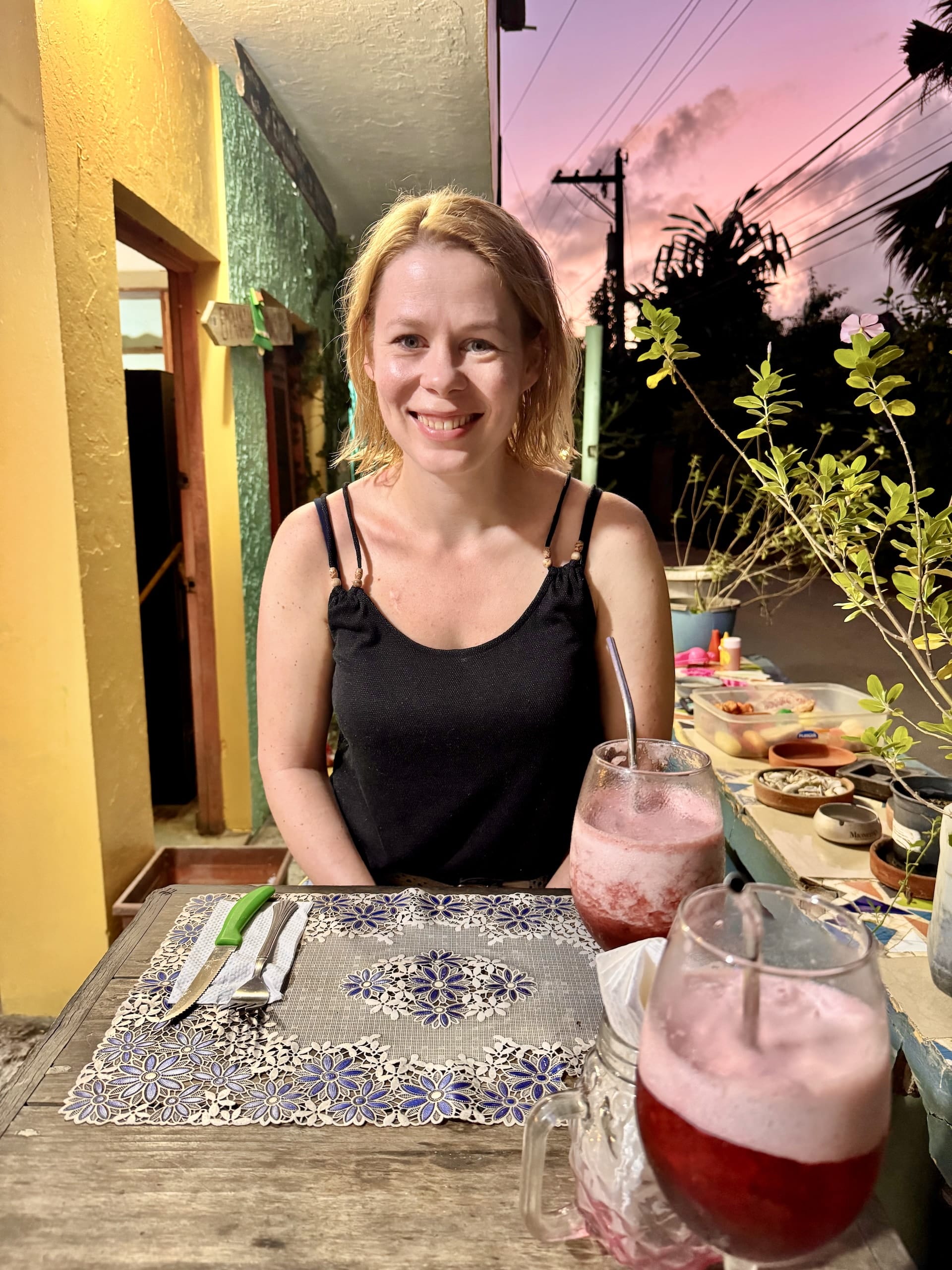 Las Terrenas, Dominican Republic Andrea with our drinks at Empanadas y más.