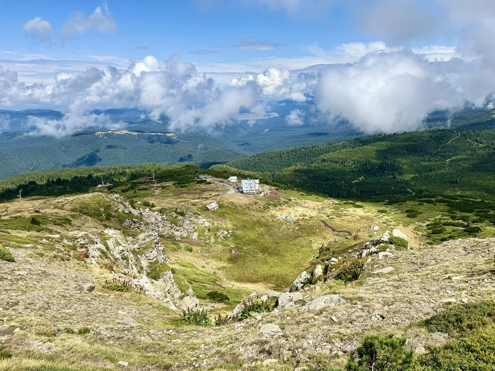 View of the Rila Lakes Chalet from the mountain ridge