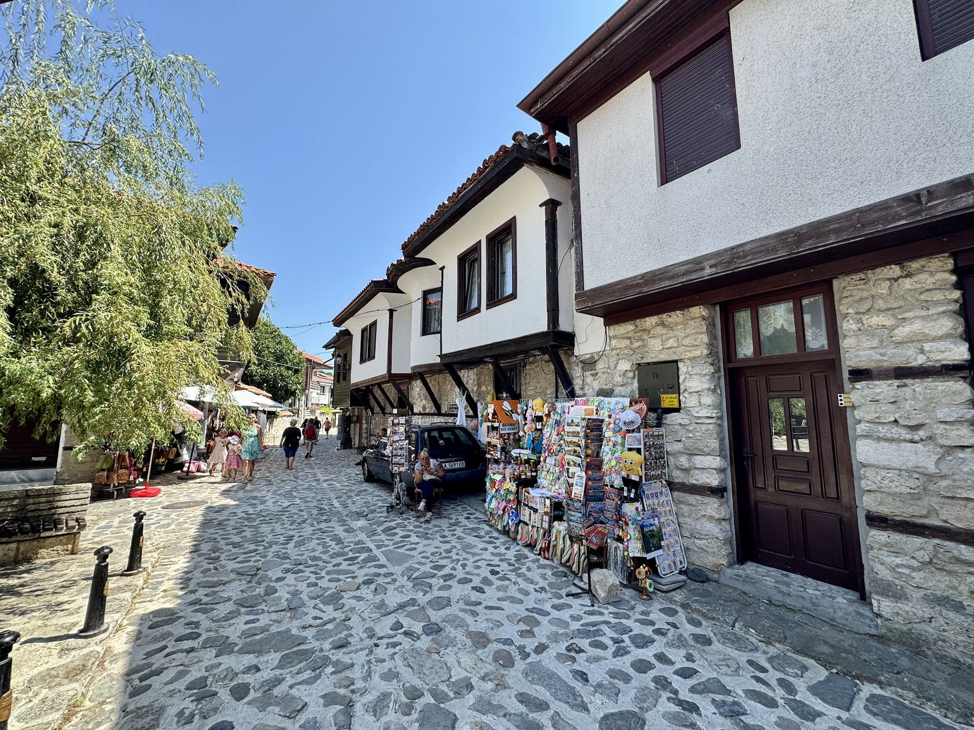 Neat Nessebar houses with souvenir shops.