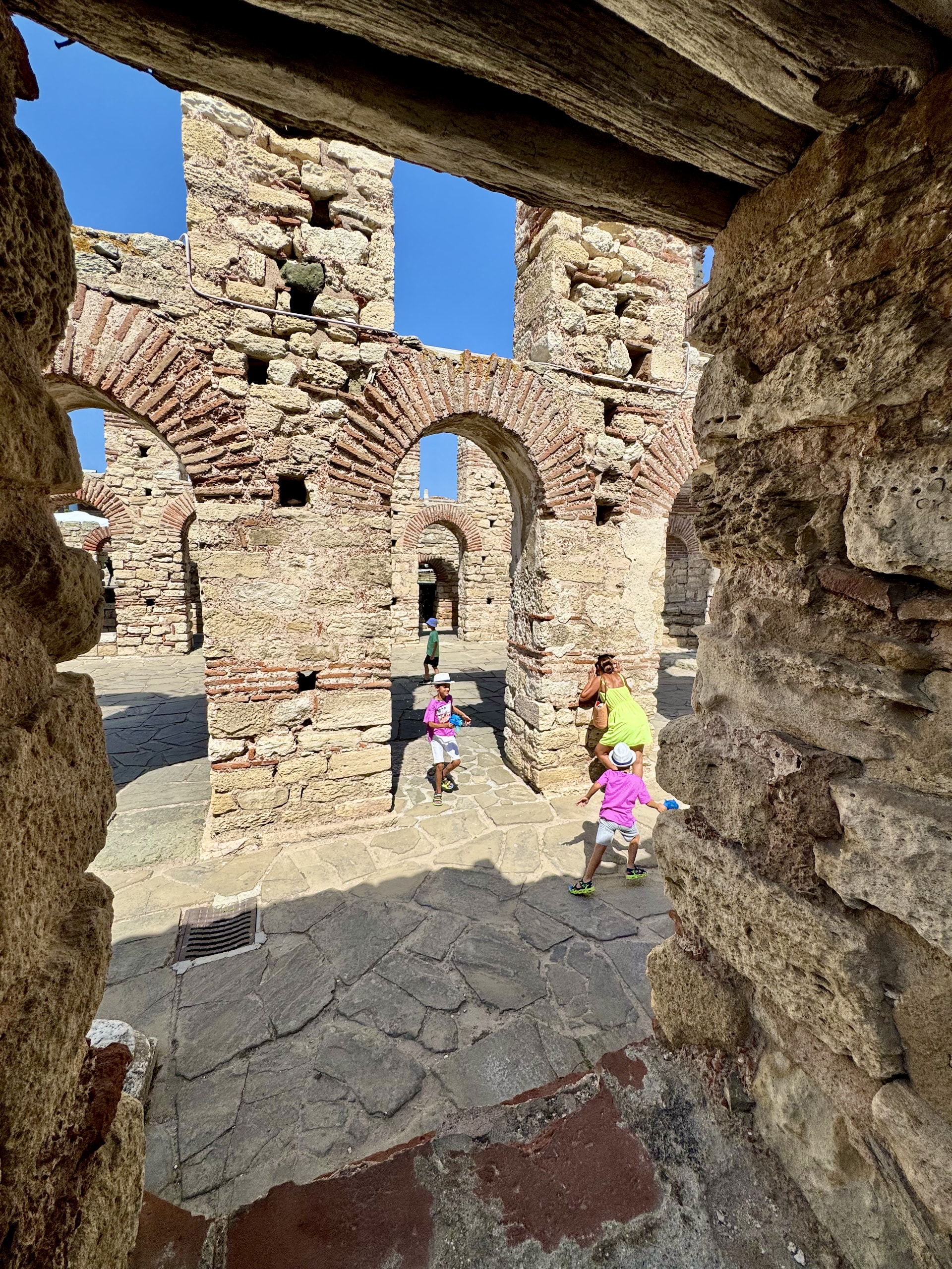 Children play within the ancient walls of St Sofia Church.