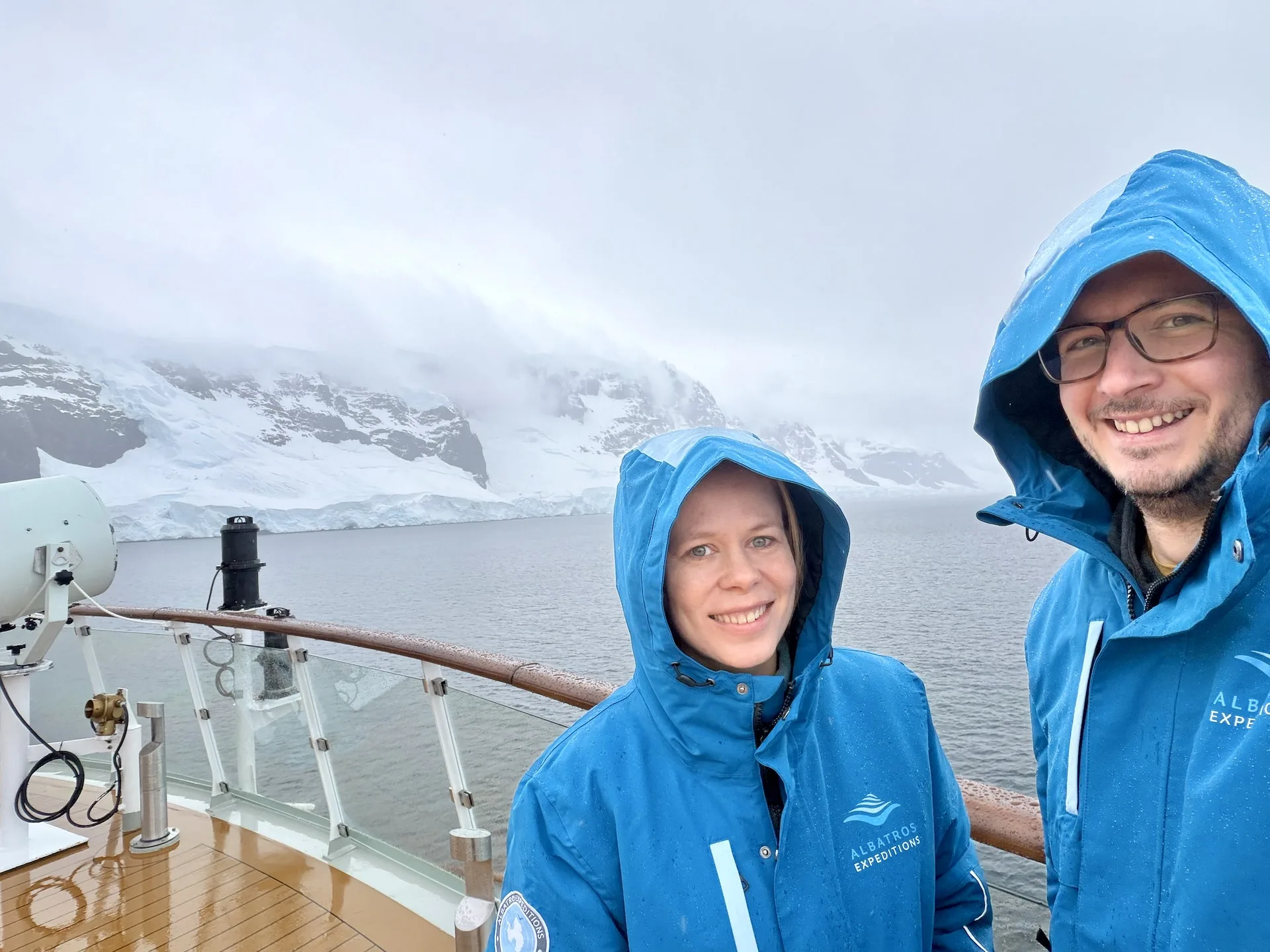 Andrea and I on deck in the rain during our crossing of the Neumayer Channel.