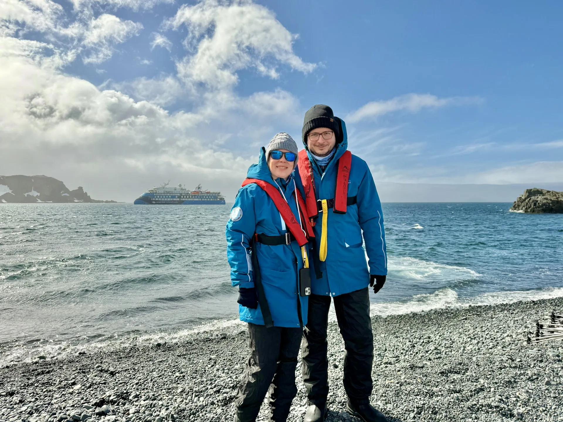 Wearing the parka gifted by Albatros Expeditions and our own waterproof pants during the first landing.