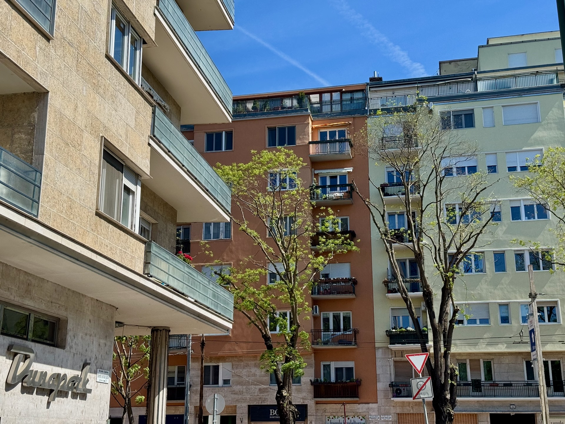 Dunapark apartment building facade on Pozsonyi út Budapest showing modernist architecture with silver lettering