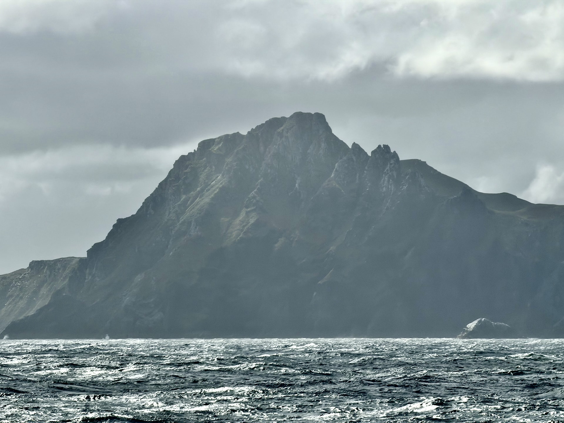 Cape Horn at the southern tip of South America seen through mist and low cloud from the Drake Passage