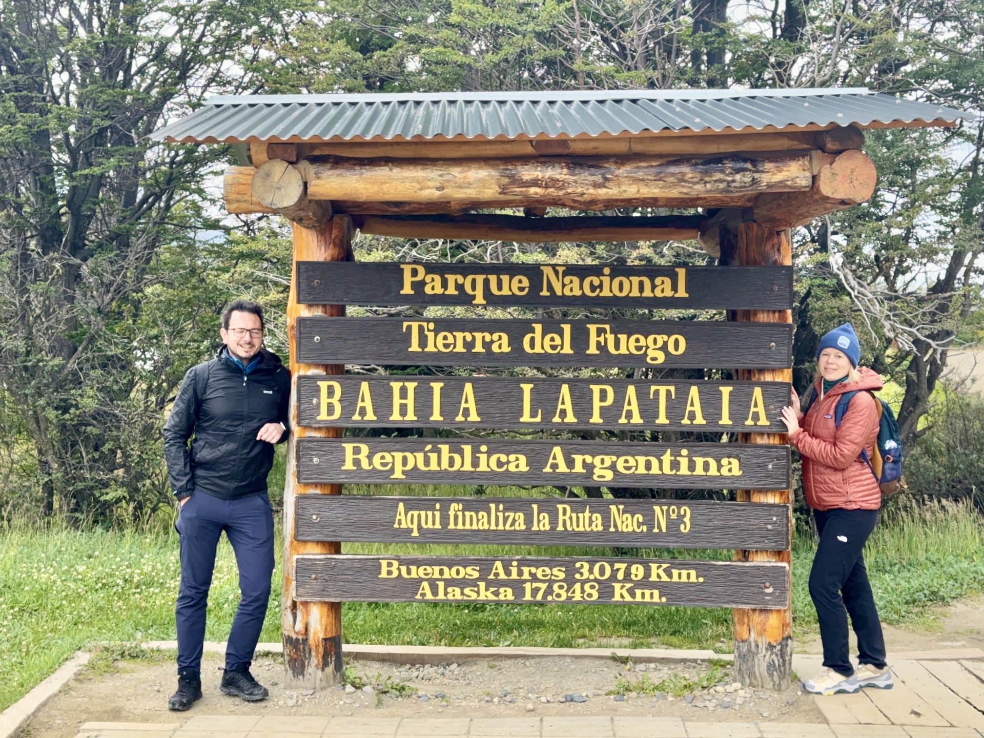 Bahía Lapataia end of Ruta Nacional 3 Tierra del Fuego National Park Argentina László and Andrea at the Bahía Lapataia sign marking the end of Ruta Nacional 3, Tierra del Fuego National Park, 17,848 km from Alaska