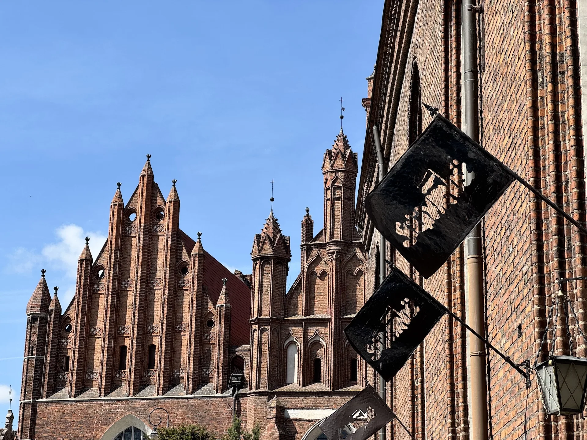 The brick towers of St. Catherine's Church, Gdańsk's oldest church, still under restoration after a 2006 fire.