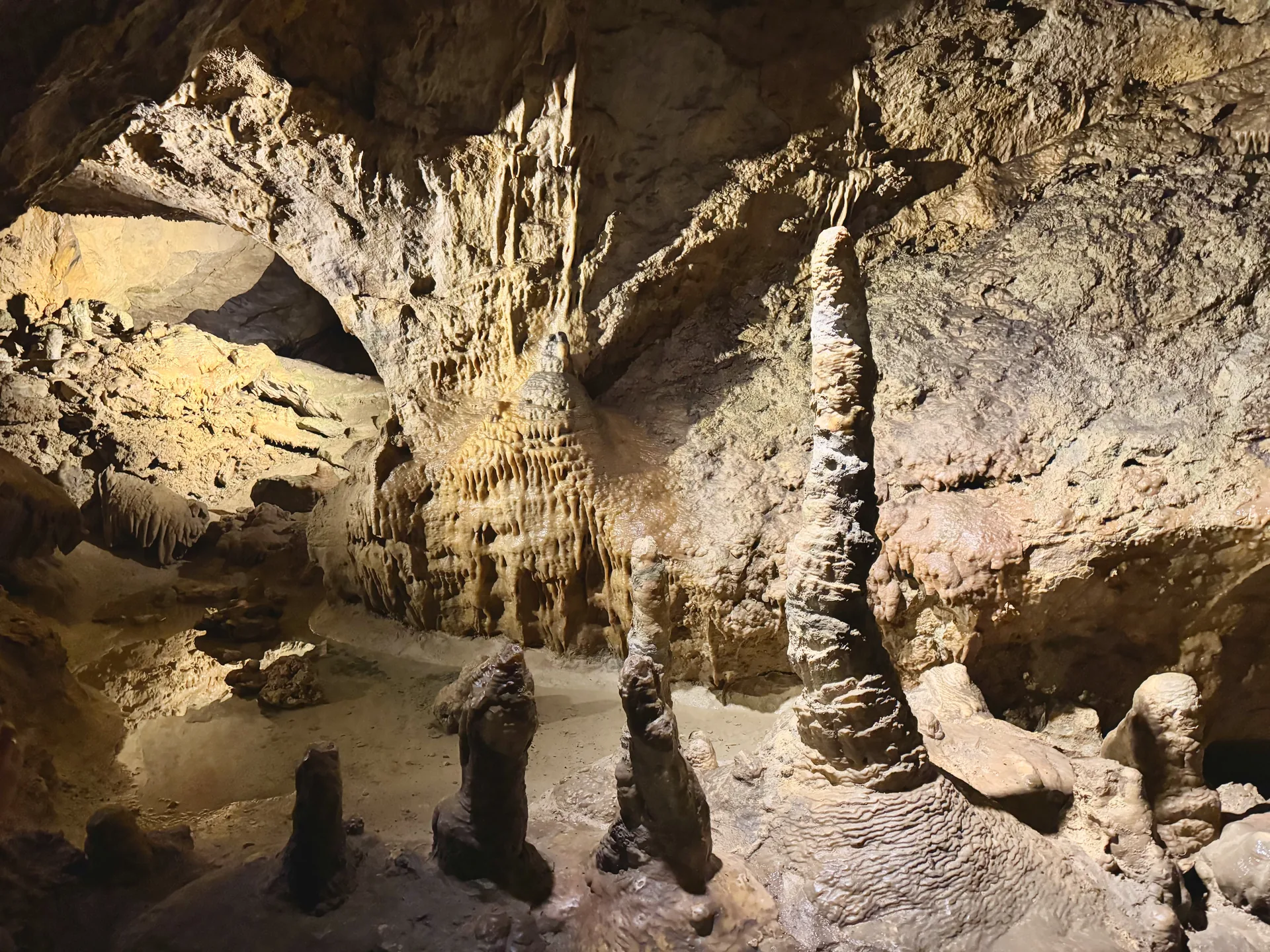 Fairyland dripstone formations, Pál-völgyi cave Budapest Stalagmites and a tall dripstone column in a chamber of the Pál-völgyi cave