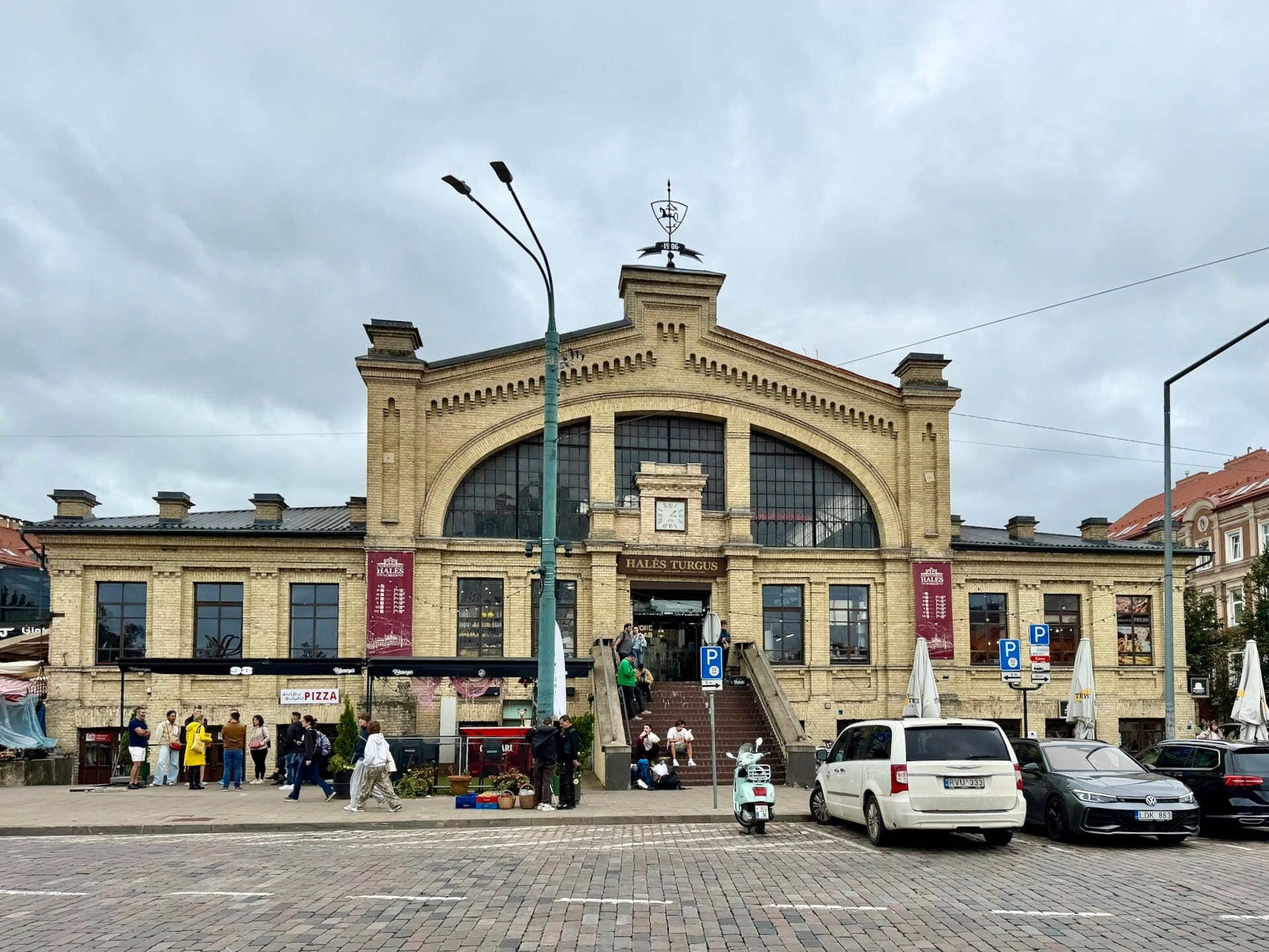 Halės Turgus market hall in Vilnius The yellow brick facade and arched window of the Halės Turgus market hall in Vilnius.