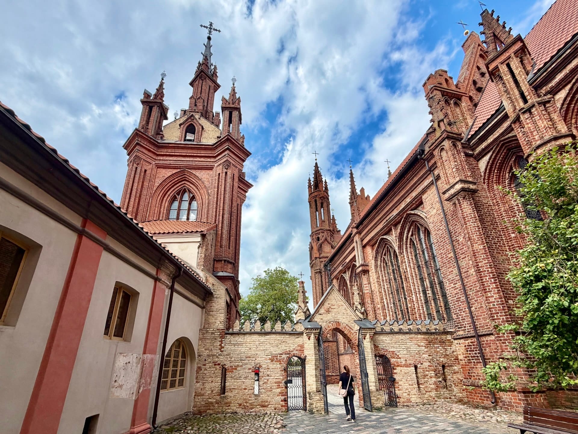 St Anne's Church and the Bernardine church in Vilnius The red brick Gothic front of St Anne's Church in Vilnius with the Bernardine church rising behind it.